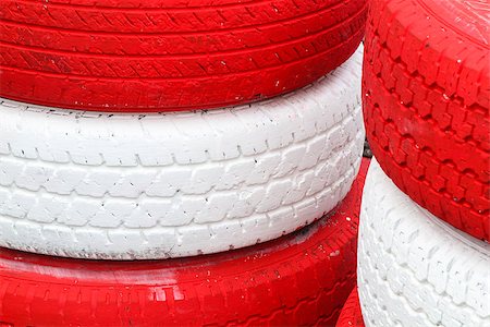 simsearch:400-04779873,k - Pile red and white rubber tires for background Foto de stock - Super Valor sin royalties y Suscripción, Código: 400-07299050