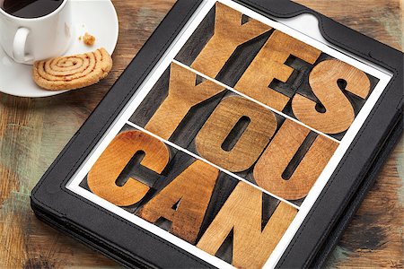 simsearch:400-07179122,k - Yes you can - motivational slogan on a digital tablet with a cup of coffee Stock Photo - Budget Royalty-Free & Subscription, Code: 400-07299142