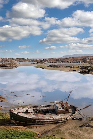 old fishing boat beached on a coastal beach in county Donegal, Ireland Stock Photo - Budget Royalty-Free & Subscription, Code: 400-07299163