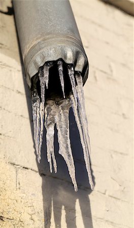 transparent icicles on a drainpipe Fotografie stock - Microstock e Abbonamento, Codice: 400-07299174