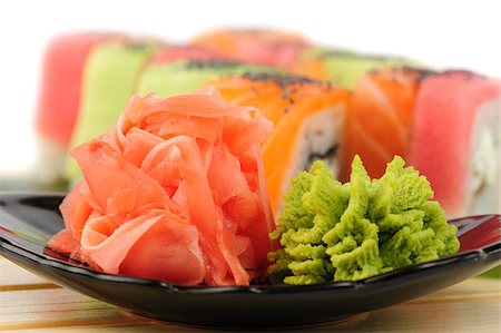starush (artist) - Rainbow sushi at wooden plate, focus at wasabi and ginger Stockbilder - Microstock & Abonnement, Bildnummer: 400-07299181