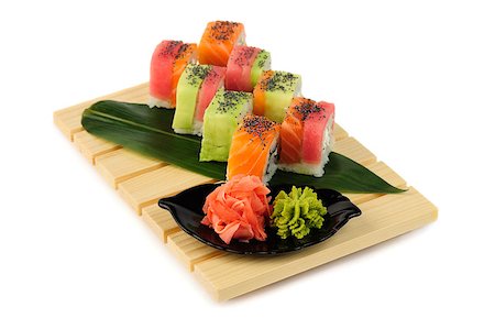 starush (artist) - Rainbow sushi at wooden plate, isolated on white Stockbilder - Microstock & Abonnement, Bildnummer: 400-07299182