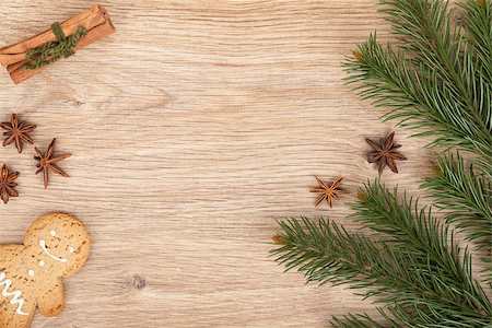 pine cone pattern - Christmas fir tree, gingerbread cookie and spices on wooden table Stock Photo - Budget Royalty-Free & Subscription, Code: 400-07299357