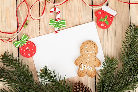 simsearch:400-07299371,k - Christmas fir tree, gingerbread cookies and card for copy space on wooden table Foto de stock - Super Valor sin royalties y Suscripción, Código: 400-07299368