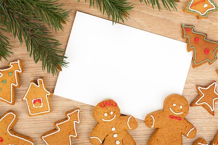 simsearch:400-07299371,k - Christmas fir tree, gingerbread cookies and card for copy space on wooden table Foto de stock - Super Valor sin royalties y Suscripción, Código: 400-07299369