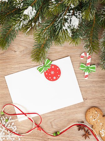 simsearch:400-07299371,k - Christmas fir tree, gingerbread cookies and card for copy space on wooden table Foto de stock - Super Valor sin royalties y Suscripción, Código: 400-07299361