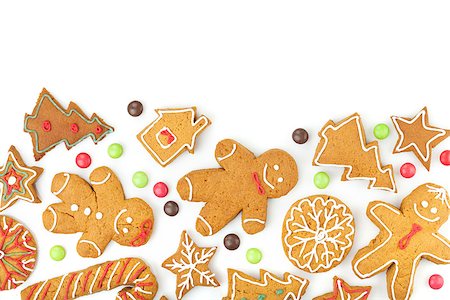 simsearch:400-07175496,k - Homemade various christmas gingerbread cookies on white background Fotografie stock - Microstock e Abbonamento, Codice: 400-07299378