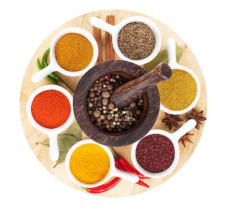 simsearch:400-07299238,k - Various spices selection on cutting board. Isolated on white background Photographie de stock - Aubaine LD & Abonnement, Code: 400-07299418