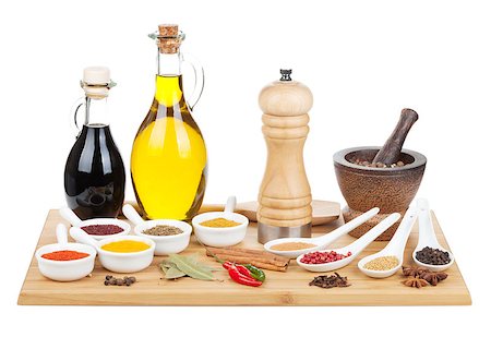 simsearch:400-06559340,k - Various spices selection on cutting board. Isolated on white background Stock Photo - Budget Royalty-Free & Subscription, Code: 400-07299426