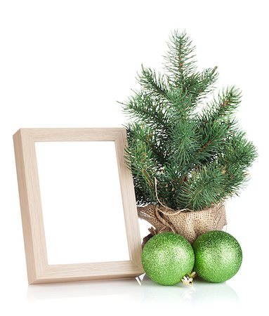 simsearch:400-07179654,k - Photo frame, christmas tree and baubles. Isolated on white background Photographie de stock - Aubaine LD & Abonnement, Code: 400-07299434