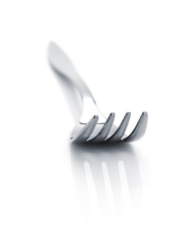 simsearch:824-07310346,k - Fork. Silverware isolated on white background Foto de stock - Super Valor sin royalties y Suscripción, Código: 400-07299479