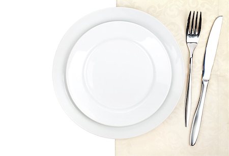 simsearch:824-07310346,k - Silverware or flatware set of fork, knife and plate on towel. Isolated on white background Foto de stock - Super Valor sin royalties y Suscripción, Código: 400-07299487