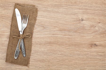 simsearch:824-07310346,k - Silverware or flatware set of fork and knife on wooden table Foto de stock - Super Valor sin royalties y Suscripción, Código: 400-07299501