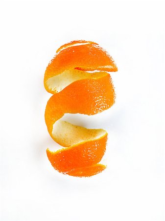 Peel of an orange on white background Foto de stock - Super Valor sin royalties y Suscripción, Código: 400-07290062
