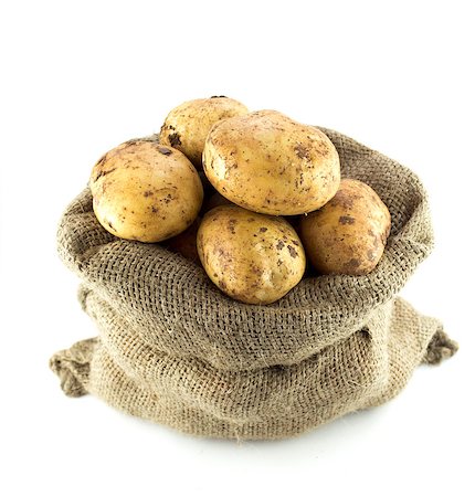 simsearch:400-09112314,k - potatoes in burlap sack isolated on white background Fotografie stock - Microstock e Abbonamento, Codice: 400-07290571