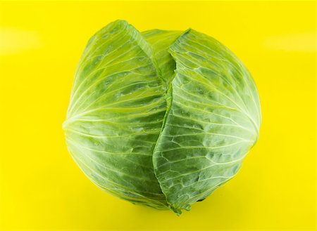 Fresh green cabbage on yellow background . Stock Photo - Budget Royalty-Free & Subscription, Code: 400-07290598
