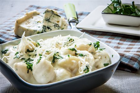 italian potato noodle with cheese sauce and basil Stock Photo - Budget Royalty-Free & Subscription, Code: 400-07291055