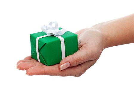 simsearch:400-05747950,k - Small gift box in woman hand - christmas present, isolated Foto de stock - Super Valor sin royalties y Suscripción, Código: 400-07291294
