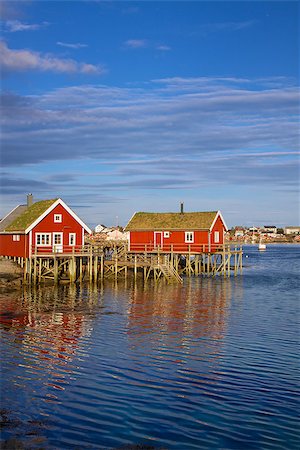 simsearch:400-08428494,k - Typical red rorbu hut with sod roof in town of Reine on Lofoten islands in Norway Stockbilder - Microstock & Abonnement, Bildnummer: 400-07291620