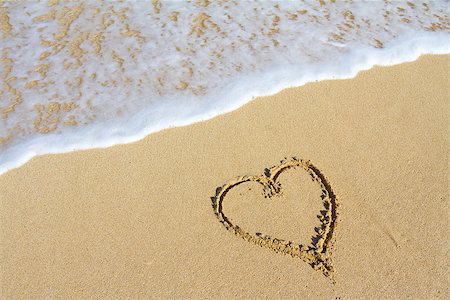 simsearch:400-08495448,k - A heart is drawn in the sand on the Hawaii beach showing an image of white sand, water, waves, and the symbol for love. This would be a great image for a honeymoon, valentines day, or any sort of love design that needs a tropical vacation look. Stock Photo - Budget Royalty-Free & Subscription, Code: 400-07291922