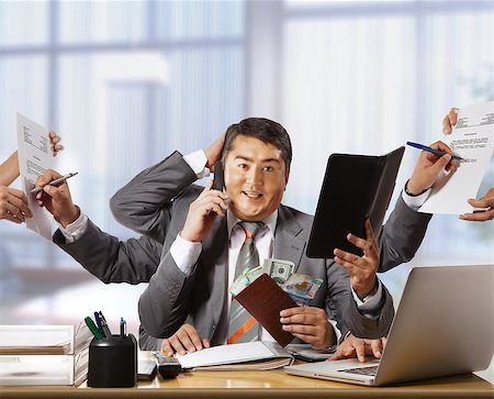 simsearch:400-05022667,k - businessman with eight hands in elegant suit working hold notepad clipboard, cell phone, paper, document, contract, folder business plan. Concept of busy Stockbilder - Microstock & Abonnement, Bildnummer: 400-07292596