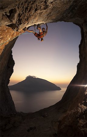 simsearch:400-07292725,k - Rock climber at sunset. Kalymnos Island, Greece Photographie de stock - Aubaine LD & Abonnement, Code: 400-07292727