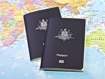 simsearch:400-08836825,k - Australian passport with the World map in the background Foto de stock - Super Valor sin royalties y Suscripción, Código: 400-07292984