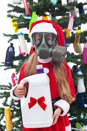 Young girl with her plastic christmas present - environmental concept, isolated Stock Photo - Budget Royalty-Free & Subscription, Code: 400-07293096