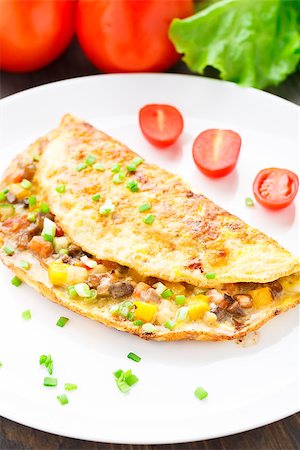 simsearch:400-04855335,k - Omelet with diced vegetables on a plate Foto de stock - Royalty-Free Super Valor e Assinatura, Número: 400-07293332