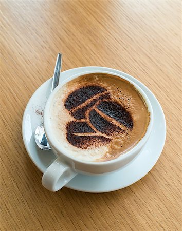 simsearch:400-07306295,k - Cup of coffee and coffee shape on a cream Foto de stock - Super Valor sin royalties y Suscripción, Código: 400-07304482