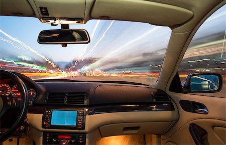 Car interior on driving. Blurred night lights Stockbilder - Microstock & Abonnement, Bildnummer: 400-07304510