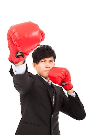 simsearch:400-04333650,k - Business man ready to fight with boxing gloves Stock Photo - Budget Royalty-Free & Subscription, Code: 400-07304642