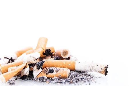 stop smoking - stop smoking cigarettes ashtrey nicotine closeup isolated object Stock Photo - Budget Royalty-Free & Subscription, Code: 400-07304971