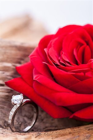 simsearch:400-07306125,k - beautiful ring on wooden background and red rose present valentines Stock Photo - Budget Royalty-Free & Subscription, Code: 400-07305103