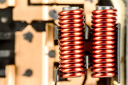 electromagnetism - An electrical coil with iron core, detail of the control device used in the automotive industry shown up close Photographie de stock - Aubaine LD & Abonnement, Code: 400-07305428