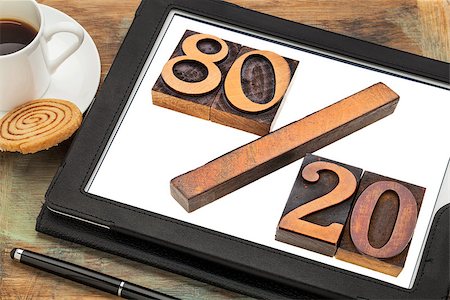 simsearch:400-07179122,k - Pareto principle or eighty-twenty rule represented in wood letterpress printing blocks on a digital tablet screen Stock Photo - Budget Royalty-Free & Subscription, Code: 400-07305502