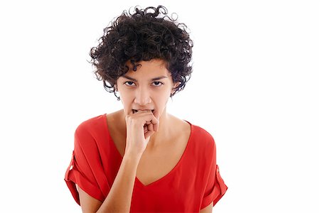 envy hands - hispanic frustrated woman biting fingers, angry, looking at camera Stock Photo - Budget Royalty-Free & Subscription, Code: 400-07305521