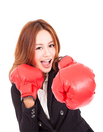 young attractive business woman with boxing gloves Stock Photo - Budget Royalty-Free & Subscription, Code: 400-07305590
