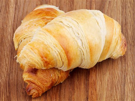 simsearch:400-07420117,k - Two Freshly Baked Croissants on Wooden background Stock Photo - Budget Royalty-Free & Subscription, Code: 400-07305602