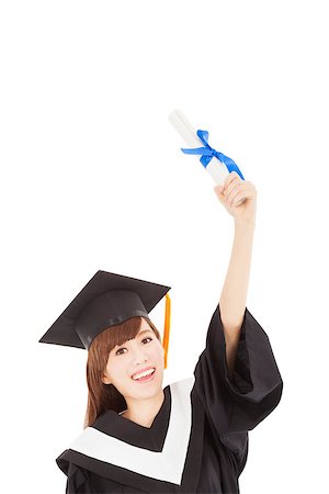 simsearch:6109-06003585,k - Young graduate girl student holding diploma and hand up Foto de stock - Royalty-Free Super Valor e Assinatura, Número: 400-07305825