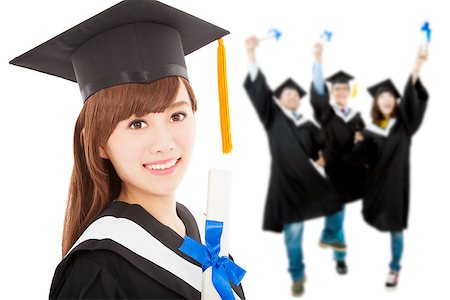 simsearch:6109-06003585,k - Young graduate girl student holding  diploma with classmates Foto de stock - Royalty-Free Super Valor e Assinatura, Número: 400-07305826