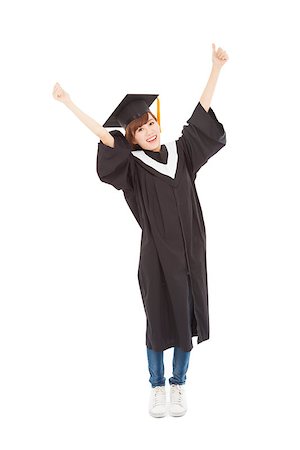 simsearch:6109-06003585,k - happy Young graduate girl student standing and hand up Foto de stock - Royalty-Free Super Valor e Assinatura, Número: 400-07305827