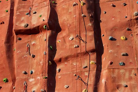 photojope (artist) - An artificial rock textured climbing wall background with holds, incuts, protrusions, hooks, carbines and ropes. Fotografie stock - Microstock e Abbonamento, Codice: 400-07306748