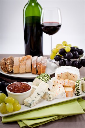 simsearch:400-04040057,k - different cheese types on plate with grapes and red wine on wooden table Stock Photo - Budget Royalty-Free & Subscription, Code: 400-07307124