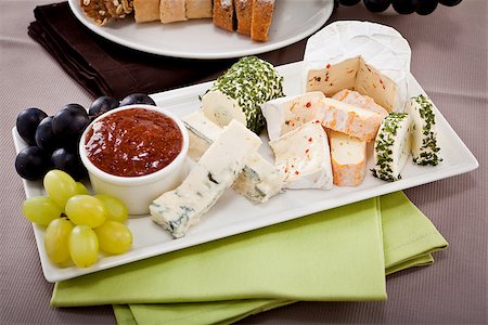 simsearch:400-04040057,k - different cheese types on plate with grapes and red wine on wooden table Stock Photo - Budget Royalty-Free & Subscription, Code: 400-07307125