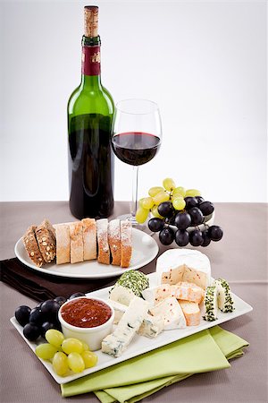 simsearch:400-03992643,k - different cheese types on plate with grapes and red wine on wooden table Stock Photo - Budget Royalty-Free & Subscription, Code: 400-07307127