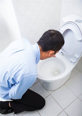 Young man drunk or sick vomiting Stock Photo - Budget Royalty-Free & Subscription, Code: 400-07307838