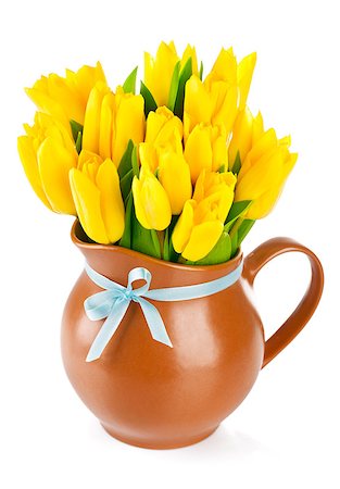 simsearch:400-04714958,k - yellow tulips flowers in jug isolated on white background Foto de stock - Super Valor sin royalties y Suscripción, Código: 400-07307848