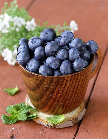 simsearch:400-06698338,k - fresh organic ripe blueberries in a wooden bowl Stock Photo - Budget Royalty-Free & Subscription, Code: 400-07307944