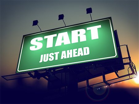 simsearch:400-07308209,k - Start Just Ahead - Green Billboard on the Rising Sun Background. Stock Photo - Budget Royalty-Free & Subscription, Code: 400-07308184